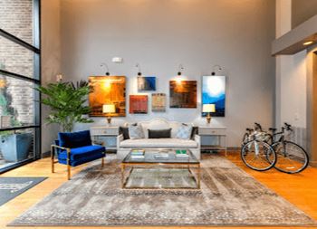 a living room with a couch and a table